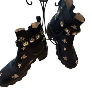 Gucci Black Moto Boots with Gold Accents